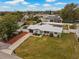 Quaint single-story home boasting a well-kept lawn, an attached garage, and a charming curb appeal at 1074 Abeline Dr, Deltona, FL 32725