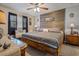 Bedroom with a wood accent wall and ample natural light at 1074 Abeline Dr, Deltona, FL 32725