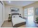 A main bedroom featuring a neutral palette, with modern furnishings and an attached sunroom at 1102 Bocana Dr # 1102, Casselberry, FL 32707