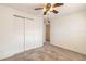 Bedroom featuring neutral carpet and a closet with sliding doors at 1117 Berkshire Rd, Daytona Beach, FL 32117