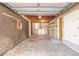 Unfinished garage featuring laundry hookups and ample storage space at 1117 Berkshire Rd, Daytona Beach, FL 32117