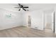 Bright bedroom with ensuite bathroom access and neutral decor at 1216 Sunland Rd, Daytona Beach, FL 32114