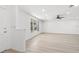 Bright, airy living room with stylish flooring, recessed lighting, and ample natural light at 1216 Sunland Rd, Daytona Beach, FL 32114