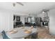 Bright living space with ceiling fans, an open floor plan, and wood-look tile flooring at 1268 Bel Aire Dr, Daytona Beach, FL 32118