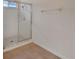 Bathroom with a glass-enclosed shower and tile floors at 1429 Carlow Cir, Ormond Beach, FL 32174