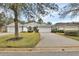 Charming one-story home featuring a two-car garage and well-maintained landscaping at 1429 Carlow Cir, Ormond Beach, FL 32174