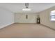 Large two car garage with door to the side and water heater at 1429 Carlow Cir, Ormond Beach, FL 32174