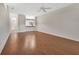 Open living room layout featuring wood floors and neutral walls at 1429 Carlow Cir, Ormond Beach, FL 32174