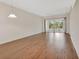 Inviting living room with hardwood floors and sliding glass doors for ample natural light at 1429 Carlow Cir, Ormond Beach, FL 32174