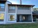 Exterior view of home with windows and a screened-in porch at 168 Olive Tree Cir # 168, Altamonte Springs, FL 32714