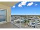 Relaxing balcony view overlooking neighborhood and blue skies at 1900 N Atlantic Ave # 901, Daytona Beach, FL 32118