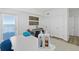 Bright dining area featuring ocean view balcony access, decorative art, and two closets at 1900 N Atlantic Ave # 901, Daytona Beach, FL 32118