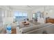 Open-concept living room featuring ocean views and hardwood flooring at 1900 N Atlantic Ave # 901, Daytona Beach, FL 32118