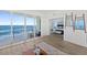Balcony access from the living room with ocean view and access to the main bedroom at 1900 N Atlantic Ave # 901, Daytona Beach, FL 32118