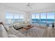Spacious living room with ocean views and plenty of comfortable seating at 1900 N Atlantic Ave # 901, Daytona Beach, FL 32118