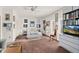 Bright bedroom with built-in shelves, decoratively adorned walls and comfortable furnishings at 1924 Seclusion Dr, Port Orange, FL 32128