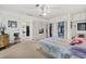 Spacious bedroom featuring built-in cabinets and a walk-in closet for ample storage at 1924 Seclusion Dr, Port Orange, FL 32128