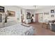 Cozy bedroom with white furniture, framed artwork and a sliding glass door at 1924 Seclusion Dr, Port Orange, FL 32128