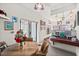 Cozy dining area featuring a wood table, bright lighting, and access to the outdoors through sliding glass doors at 1924 Seclusion Dr, Port Orange, FL 32128
