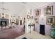 Warm and inviting hallway with tile and carpet flooring and an array of fine art at 1924 Seclusion Dr, Port Orange, FL 32128