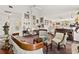 Elegant living room boasting plush carpeting and an inviting sitting area, perfect for relaxation and social gatherings at 1924 Seclusion Dr, Port Orange, FL 32128