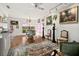 Bright living room featuring hardwood floors, and eclectic decorations and artwork at 1924 Seclusion Dr, Port Orange, FL 32128
