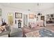 Inviting living room featuring a comfortable seating area with decorative art and natural light at 1924 Seclusion Dr, Port Orange, FL 32128