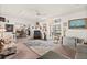 Spacious living room with plush seating, unique area rug and an abundance of natural light at 1924 Seclusion Dr, Port Orange, FL 32128