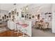 Open-concept living space with a bar area, dining table, and tasteful décor at 1924 Seclusion Dr, Port Orange, FL 32128