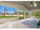 The outdoor patio has great views of the manicured lawn and blue skies at 1924 Seclusion Dr, Port Orange, FL 32128