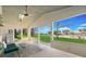 Outdoor patio with expansive views of the lush green lawn and blue skies at 1924 Seclusion Dr, Port Orange, FL 32128