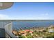 Scenic aerial view of waterfront homes with docks along a beautiful bay area with lush landscaping at 2 Oceans West Blvd # 1905, Daytona Beach Shores, FL 32118
