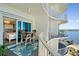 Relax on the balcony with a table and chairs, and direct access to the primary bedroom suite at 2 Oceans West Blvd # 1905, Daytona Beach Shores, FL 32118