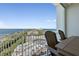 Relaxing balcony area with seating, offering a stunning view of the surrounding waterway at 2 Oceans West Blvd # 1905, Daytona Beach Shores, FL 32118