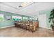 Community bar area featuring a long seating area, kitchen area, and a window view at 2 Oceans West Blvd # 1905, Daytona Beach Shores, FL 32118