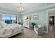 Relax in this beautifully decorated bedroom that offers sliding glass doors leading to a private balcony at 2 Oceans West Blvd # 1905, Daytona Beach Shores, FL 32118