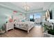 Relax in this beautifully decorated bedroom that offers sliding glass doors leading to a private balcony at 2 Oceans West Blvd # 1905, Daytona Beach Shores, FL 32118