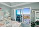 Relax in this beautifully decorated bedroom that offers sliding glass doors leading to a private balcony at 2 Oceans West Blvd # 1905, Daytona Beach Shores, FL 32118