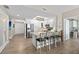 Bright kitchen features white cabinetry, stainless steel appliances, and a breakfast bar with seating at 2 Oceans West Blvd # 1905, Daytona Beach Shores, FL 32118