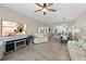 Open floor plan with living and dining areas, accented by modern furnishings and stylish decor at 2 Oceans West Blvd # 1905, Daytona Beach Shores, FL 32118