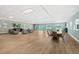 Spacious community meeting room featuring modern decor, and plenty of table and lounge seating at 2 Oceans West Blvd # 1905, Daytona Beach Shores, FL 32118