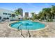 Beautiful community pool with lounge seating, clear water and well manicured landscaping at 2 Oceans West Blvd # 1905, Daytona Beach Shores, FL 32118