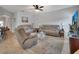 Relaxing living room showcasing comfortable seating and neutral decor at 205 Victoria Trails Blvd, Deland, FL 32724