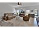 Spacious living room offers comfortable seating and a bright, airy atmosphere at 205 Victoria Trails Blvd, Deland, FL 32724