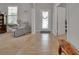 Inviting foyer showcasing tile flooring and ample natural light with a view into the living room at 205 Victoria Trails Blvd, Deland, FL 32724