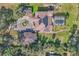 Aerial view of the home showing the courtyard with a fountain and swimming pool at 2111 Hontoon Rd, Deland, FL 32720