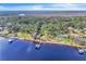 Waterfront home with large backyard, dock, and mature trees at 2111 Hontoon Rd, Deland, FL 32720