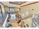 Grand foyer showcasing a chandelier, tile flooring, staircase, and iron railing detail at 2111 Hontoon Rd, Deland, FL 32720