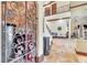 Grand foyer with an iron gate into a wine cellar, access to living area, and a grand staircase at 2111 Hontoon Rd, Deland, FL 32720