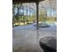 Beautiful in-ground pool featuring a relaxing spa with a screened-in lanai at 2111 Hontoon Rd, Deland, FL 32720